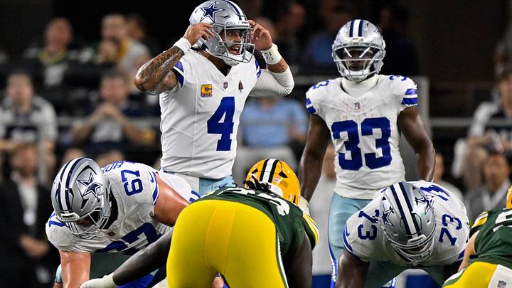 Dallas Cowboys quarterback Dak Prescott motions to his team during the game against the Green Bay Packers. Dallas Cowboys quarterback Dak Prescott motions to his team during the game against the Green Bay Packers.