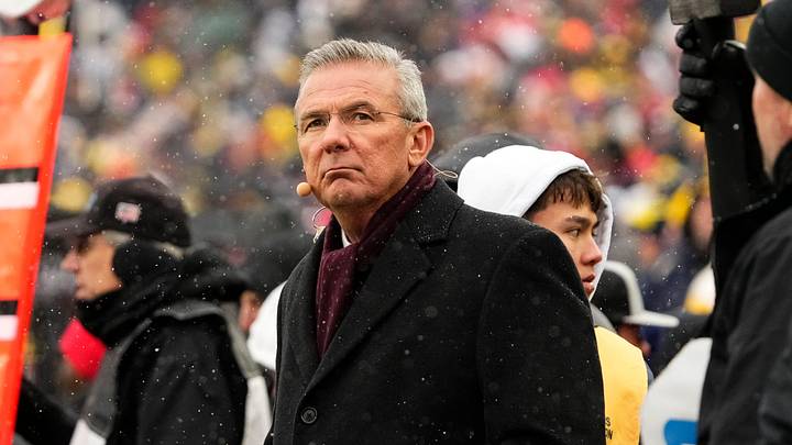 Former head coach Urban Meyer watches from the sideline during the NCAA football game between the Michigan Wolverines and the Ohio State Buckeyes at Michigan Stadium in Ann Arbor, Mich. on Nov. 29, 2025. Ohio State won 27-9. Former head coach Urban Meyer watches from the sideline during the NCAA football game between the Michigan Wolverines and the Ohio State Buckeyes at Michigan Stadium in Ann Arbor, Mich. on Nov. 29, 2025. Ohio State won 27-9.