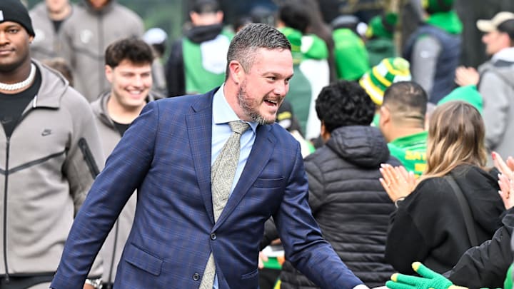 Dec 20, 2025; Eugene, OR, USA; Oregon Ducks head coach Dan Lanning greets fans before the game against the James Madison Dukes at Autzen Stadium. Mandatory Credit: Craig Strobeck-Imagn Images Dec 20, 2025; Eugene, OR, USA; Oregon Ducks head coach Dan Lanning greets fans before the game against the James Madison Dukes at Autzen Stadium. Mandatory Credit: Craig Strobeck-Imagn Images