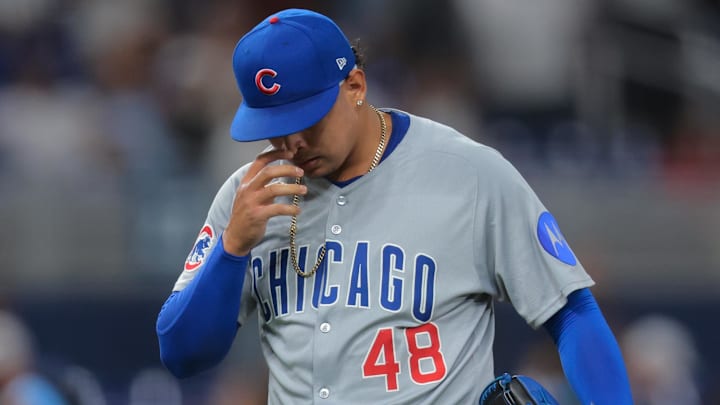 May 19, 2025; Miami, Florida, USA; Chicago Cubs relief pitcher Daniel Palencia (48) reacts after giving up a walk-off triple against the Miami Marlins during the ninth inning at loanDepot Park. Mandatory Credit: Sam Navarro-Imagn Images