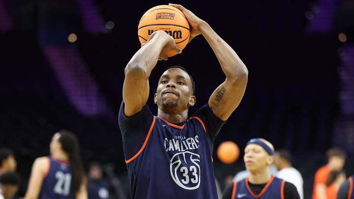 Mar 19, 2026; Philadelphia, PA, USA; Virginia Cavaliers center Ugonna Onyenso (33) shoots during a practice session ahead of the first round of the men's 2026 NCAA Tournament at Xfinity Mobile Arena. Mandatory Credit: Bill Streicher-Imagn Images Mar 19, 2026; Philadelphia, PA, USA; Virginia Cavaliers center Ugonna Onyenso (33) shoots during a practice session ahead of the first round of the men's 2026 NCAA Tournament at Xfinity Mobile Arena. Mandatory Credit: Bill Streicher-Imagn Images