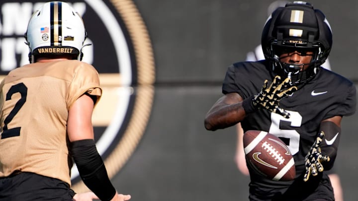 Vanderbilt quarterback Diego Pavia (2) pitches the ball to wide receiver Tre Richardson (6) during practice at FirstBank Stadium Thursday, Aug. 7, 2025, in Nashville, Tenn. Vanderbilt quarterback Diego Pavia (2) pitches the ball to wide receiver Tre Richardson (6) during practice at FirstBank Stadium Thursday, Aug. 7, 2025, in Nashville, Tenn.