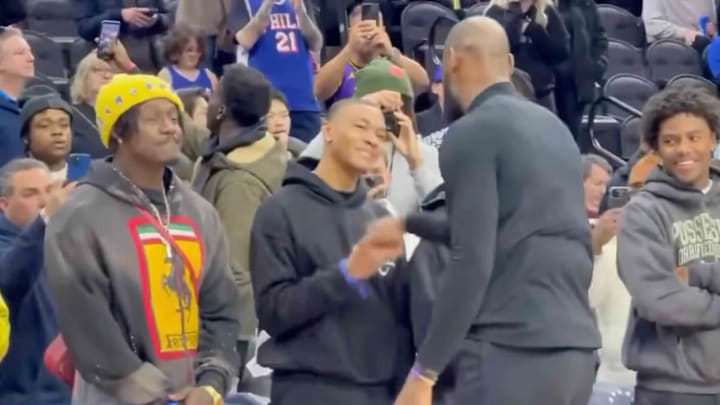 LeBron James greets DeVonta Smith on Jan. 28, 2025.