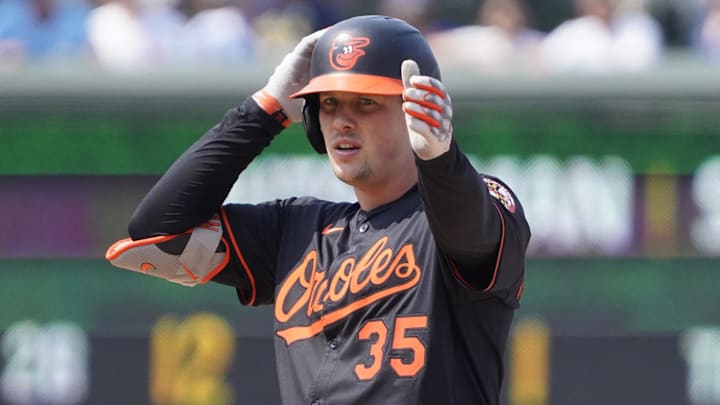 Aug 1, 2025; Chicago, Illinois, USA; Baltimore Orioles catcher Adley Rutschman (35) gestures after hitting a double against the Chicago Cubs during the ninth inning at Wrigley Field. Mandatory Credit: David Banks-Imagn Images Aug 1, 2025; Chicago, Illinois, USA; Baltimore Orioles catcher Adley Rutschman (35) gestures after hitting a double against the Chicago Cubs during the ninth inning at Wrigley Field. Mandatory Credit: David Banks-Imagn Images