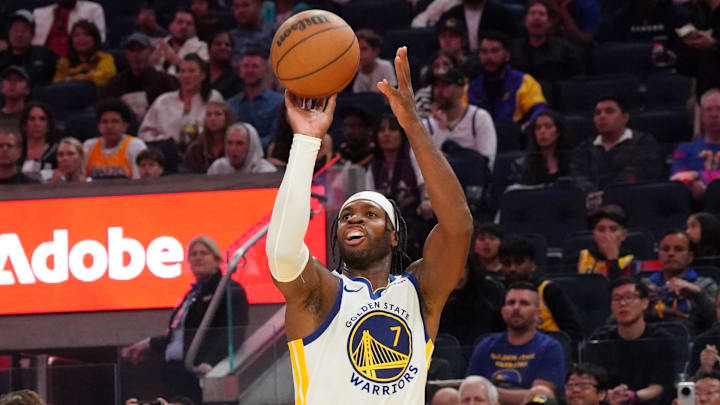 Oct 5, 2025; San Francisco, California, USA; Golden State Warriors guard Buddy Hield (7) shoots a jumpshot against the Los Angeles Lakers in the third quarter at Chase Center.