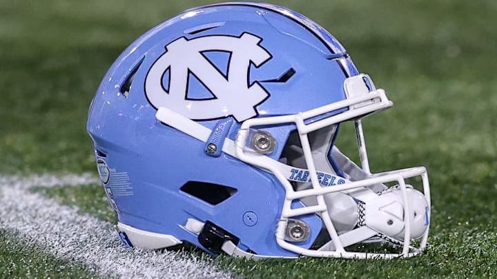 Oct 28, 2023; Atlanta, Georgia, USA; A detailed view of a North Carolina Tar Heels helmet on the field before a game against the Georgia Tech Yellow Jackets at Bobby Dodd Stadium at Hyundai Field. Mandatory Credit: Brett Davis-Imagn Images