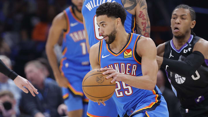 Apr 5, 2026; Oklahoma City, Oklahoma, USA; Oklahoma City Thunder guard Ajay Mitchell (25) moves past Utah Jazz guard Kennedy Chandler (0) during the second half at Paycom Center. Mandatory Credit: Alonzo Adams-Imagn Images