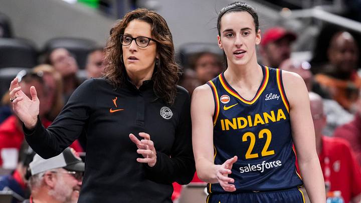 Stephanie White talks with Indiana Fever guard Caitlin Clark (22) Stephanie White talks with Indiana Fever guard Caitlin Clark (22)