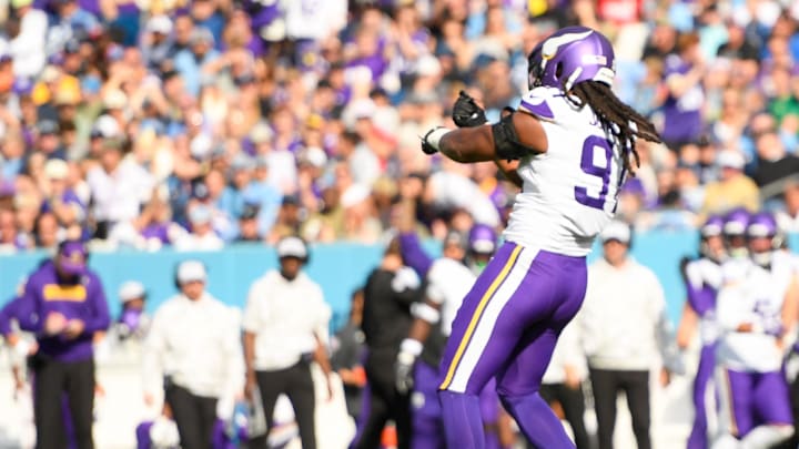 Nov 17, 2024; Nashville, Tennessee, USA; Minnesota Vikings linebacker Pat Jones II (91) celebrates his sack against Tennessee Titans Will Levis (8) during the first half at Nissan Stadium.