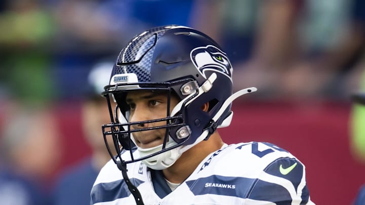 Seattle Seahawks running back Zach Charbonnet looks on