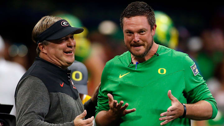 Georgia head coach Kirby Smart and Oregon head coach Dan Lanning meet during warm ups before the start of the Chick-fil-A Kickoff NCAA college football game between Oregon and Georgia in Atlanta, on Saturday, Sept. 3, 2022.

News Joshua L Jones