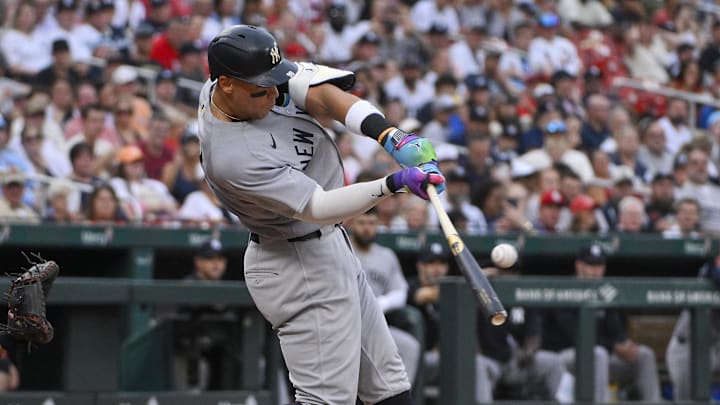 Aug 16, 2025; St. Louis, Missouri, USA;  New York Yankees designated hitter Aaron Judge (99) hits a solo home run against the St. Louis Cardinals during the third inning at Busch Stadium. Mandatory Credit: Jeff Curry-Imagn Images