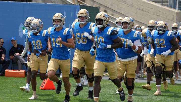 May 2, 2026; Pasadena, CA, USA; UCLA Bruins players enter the field during the spring game at Rose Bowl. Mandatory Credit: Kirby Lee-Imagn Images