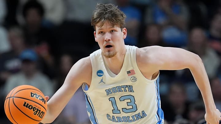 Mar 19, 2026; Greenville, SC, USA; North Carolina Tar Heels center Henri Veesaar (13) dribbles the ball against the VCU Rams in the first half of a first round game of the men's 2026 NCAA Tournament at Bon Secours Wellness Arena. Mandatory Credit: Jim Dedmon-Imagn Images