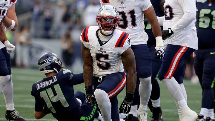 Sep 9, 2026; Seattle, Washington, USA; New England Patriots defensive end Dre'Mont Jones (5) reacts after sacking Seattle Seahawks quarterback Sam Darnold (14) during the first quarter at Lumen Field. Mandatory Credit: Joe Nicholson-Imagn Images Sep 9, 2026; Seattle, Washington, USA; New England Patriots defensive end Dre'Mont Jones (5) reacts after sacking Seattle Seahawks quarterback Sam Darnold (14) during the first quarter at Lumen Field. Mandatory Credit: Joe Nicholson-Imagn Images