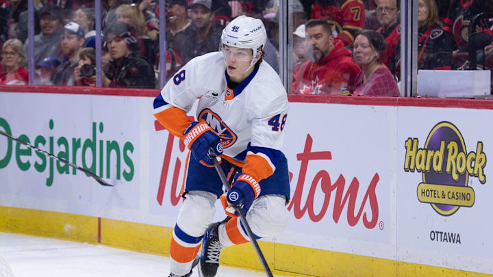 Oct 18, 2025; Ottawa, Ontario, CAN; New York Islanders defenseman Matthew Schaefer (48) skates with the puck in the first period against the Ottawa Senators at the Canadian Tire Centre. Mandatory Credit: Marc DesRosiers-IMAGN Images