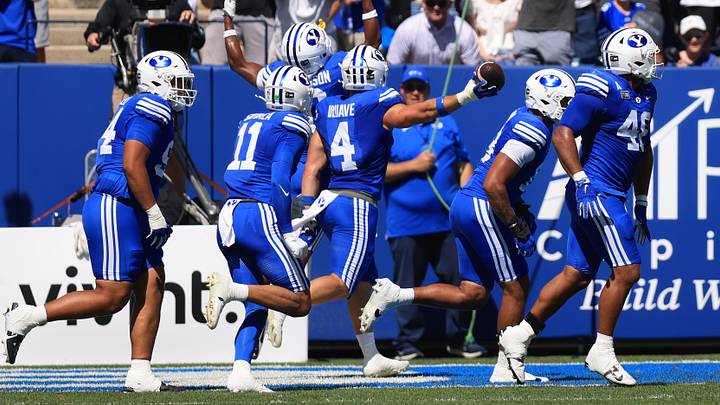 Sep 12, 2026; Provo, Utah, USA; BYU Cougars linebacker Cade Uluave (4) reacts to an interception against the Arizona Wildcats during the first quarter at LaVell Edwards Stadium. Mandatory Credit: Rob Gray-Imagn Images Sep 12, 2026; Provo, Utah, USA; BYU Cougars linebacker Cade Uluave (4) reacts to an interception against the Arizona Wildcats during the first quarter at LaVell Edwards Stadium. Mandatory Credit: Rob Gray-Imagn Images