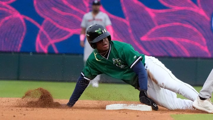 June 4, 2025; North Augusta, South Carolina, USA; Augusta GreenJacket infielder John Gil (7) slides into second base during the second game of the Augusta GreenJacket and Fayetteville series at SRP Park. Mandatory Credit: Katie Goodale - Augusta Chronicle/USA TODAY NETWORK