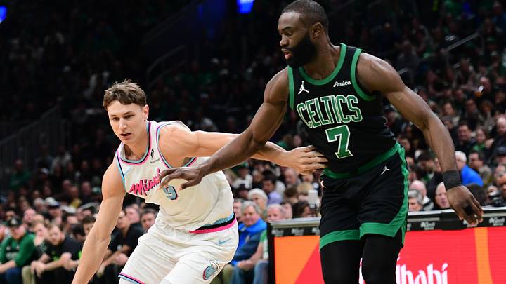 Apr 2, 2025; Boston, Massachusetts, USA; Miami Heat guard Pelle Larsson (9) dribbles against Boston Celtics guard Jaylen Brown (7) during the first half at TD Garden. Mandatory Credit: Bob DeChiara-Imagn Images Apr 2, 2025; Boston, Massachusetts, USA; Miami Heat guard Pelle Larsson (9) dribbles against Boston Celtics guard Jaylen Brown (7) during the first half at TD Garden. Mandatory Credit: Bob DeChiara-Imagn Images