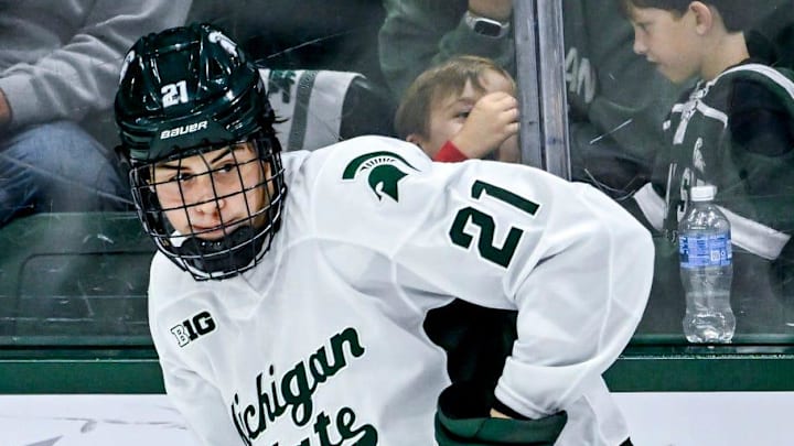 Michigan State's Anthony Romani moves the puck against New Hampshire during the second period on Thursday, Oct. 9, 2025, at Munn Ice Arena in East Lansing.