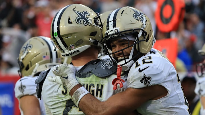 New Orleans Saints quarterback Tyler Shough (6) and wide receiver Chris Olave (12) celebrate a touchdown during the fourth quarter against the Tampa Bay Buccaneers New Orleans Saints quarterback Tyler Shough (6) and wide receiver Chris Olave (12) celebrate a touchdown during the fourth quarter against the Tampa Bay Buccaneers