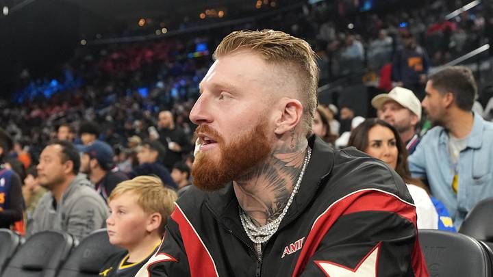 Jan 5, 2026; Inglewood, California, USA; Las Vegas Raiders defensive end Maxx Crosby (left) and wife Rachel Washburn attend the game between the Golden State Warriors and the LA Clippers at the Intuit Dome. Mandatory Credit: Kirby Lee-Imagn Images