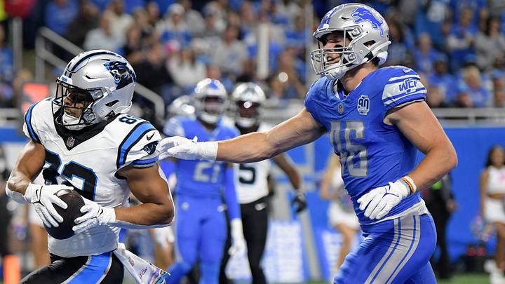 Carolina Panthers tight end Tommy Tremble (82) catches a touchdown pass in front of Detroit Lions linebacker Jack Campbell (46) Carolina Panthers tight end Tommy Tremble (82) catches a touchdown pass in front of Detroit Lions linebacker Jack Campbell (46)