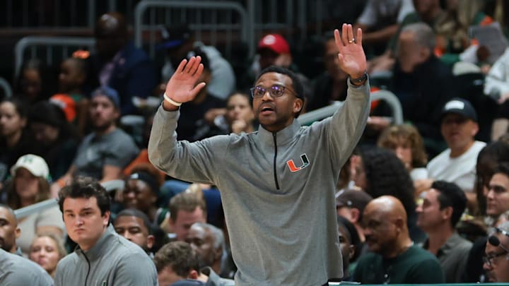 Nov 3, 2025; Coral Gables, Florida, USA; Miami Hurricanes head coach Jai Lucas reacts from he sideline against the Jacksonville Dolphins during the first half at Watsco Center. Mandatory Credit: Sam Navarro-Imagn Images