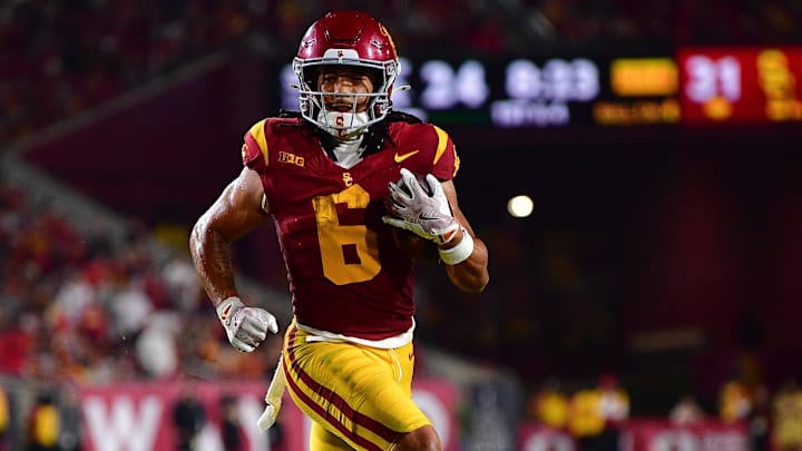 USC wide receiver Makai Lemon runs for a touchdown against the Michigan State Spartans.