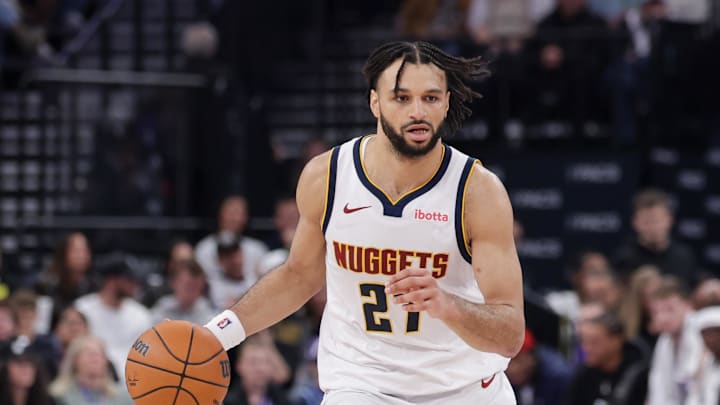 Apr 1, 2026; Salt Lake City, Utah, USA;  Denver Nuggets guard Jamal Murray (27) dribbles the ball during the second half against the Utah Jazz at Delta Center.