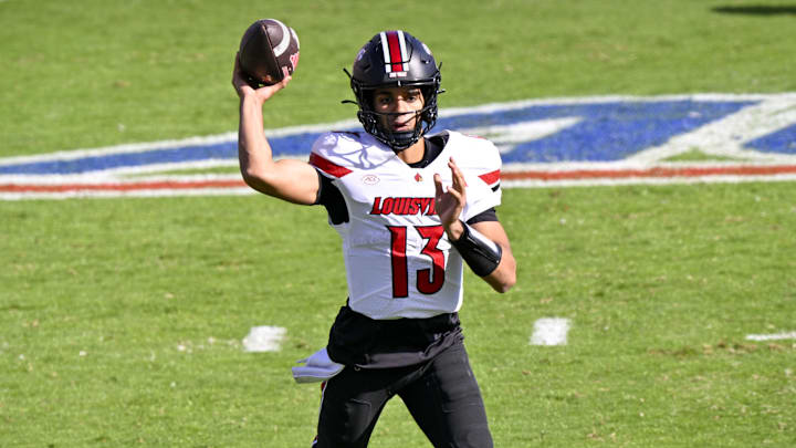 Louisville Cardinals quarterback Deuce Adams (13) officially signed with the Wisconsin Badgers in the transfer portal.