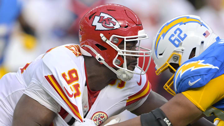 Sep 29, 2024; Inglewood, California, USA;  Kansas City Chiefs defensive tackle Chris Jones (95) and Los Angeles Chargers center Sam Mustipher (62) battle at the line in the second half at SoFi Stadium. Mandatory Credit: Jayne Kamin-Oncea-Imagn Images