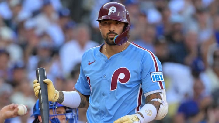 Oct 9, 2025; Los Angeles, California, USA; Philadelphia Phillies right fielder Nick Castellanos (8) reacts after striking out in the fifth inning against the Los Angeles Dodgers during game four of the NLDS round for the 2025 MLB playoffs at Dodger Stadium. Mandatory Credit: Jayne Kamin-Oncea-Imagn Images