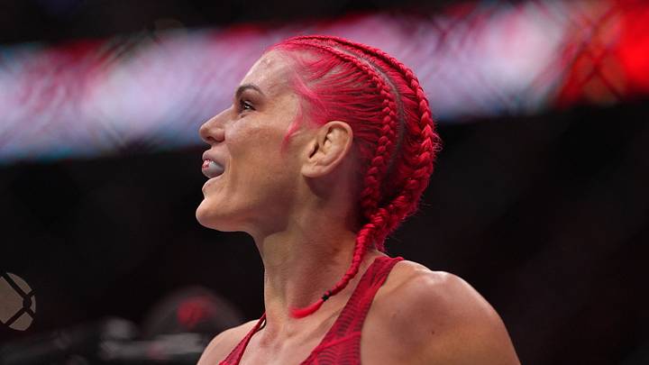 Aug 15, 2026; Philadelphia, Pennsylvania, USA; Mackenzie Dern (red gloves) fights against Gillian Robertson (blue gloves) in the women’s strawweight title bout during UFC 330 at Xfinity Mobile Arena. Mandatory Credit: Kyle Ross-Imagn Images Aug 15, 2026; Philadelphia, Pennsylvania, USA; Mackenzie Dern (red gloves) fights against Gillian Robertson (blue gloves) in the women’s strawweight title bout during UFC 330 at Xfinity Mobile Arena. Mandatory Credit: Kyle Ross-Imagn Images