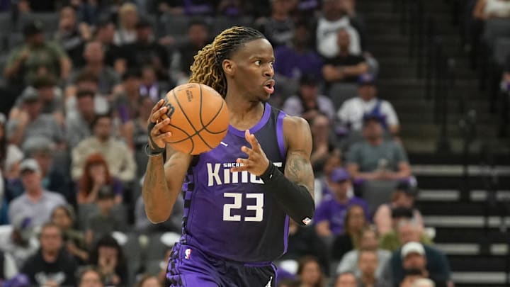 Apr 11, 2025; Sacramento, California, USA; Sacramento Kings guard Keon Ellis (23) handles the ball against the Los Angeles Clippers during the second quarter at Golden 1 Center. Mandatory Credit: Darren Yamashita-Imagn Images