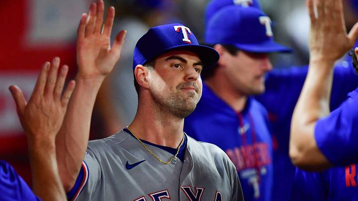 Aug 10, 2026; Anaheim, California, USA; Texas Rangers pitcher Mackenzie Gore (1) is greeted after being relieved during the sixth inning against the Los Angeles Angels at Angel Stadium. Mandatory Credit: Gary A. Vasquez-Imagn Images