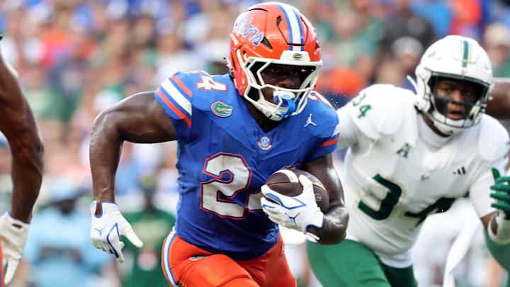 Sep 6, 2025; Gainesville, Florida, USA; Florida Gators running back Ja'Kobi Jackson (24) runs with the ball against the South Florida Bulls during the second quarter at Ben Hill Griffin Stadium. Mandatory Credit: Kim Klement Neitzel-Imagn Images