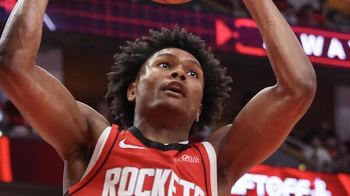 Apr 30, 2025; Houston, Texas, USA; Houston Rockets forward Amen Thompson (1) dunks against the Golden State Warriors in the fourth quarter during game five of first round for the 2025 NBA Playoffs at Toyota Center. Mandatory Credit: Thomas Shea-Imagn Images