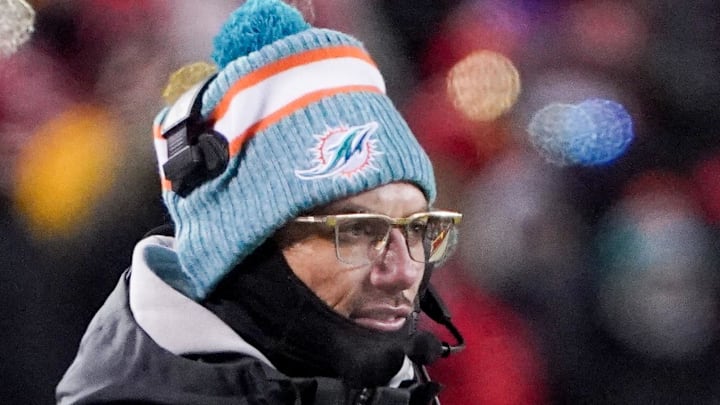 Jan 13, 2024; Kansas City, Missouri, USA; Miami Dolphins head coach Mike McDaniel  watches play against the Kansas City Chiefs in a 2024 AFC wild card game at GEHA Field at Arrowhead Stadium. Mandatory Credit: Denny Medley-Imagn Images