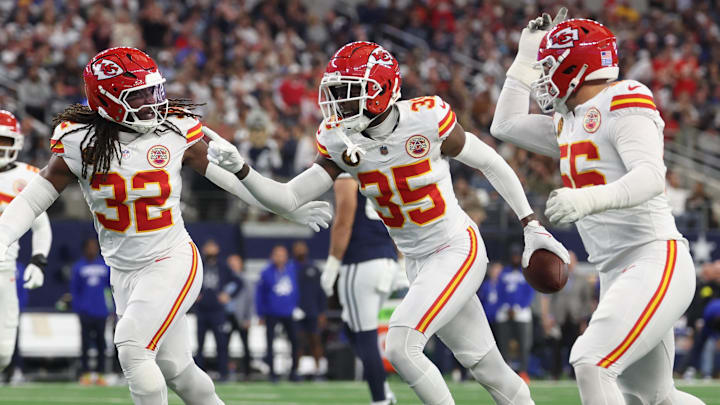 Nov 27, 2025; Arlington, Texas, USA; Kansas City Chiefs linebacker Nick Bolton (32) and Kansas City Chiefs cornerback Jaylen Watson (35) celebrate after an interception against the Dallas Cowboys during the first quarter at AT&T Stadium. Mandatory Credit: Kevin Jairaj-Imagn Images