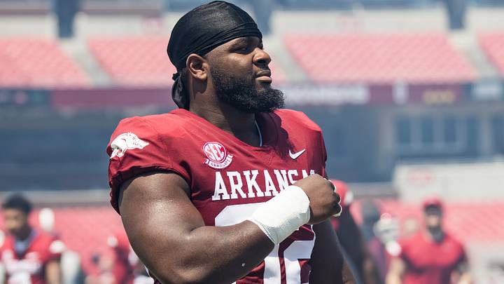 Arkansas Razorbacks defensive lineman David Oke (92) gets ready to play in the spring game at Razorback Stadium.