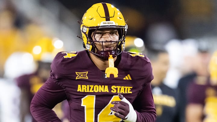 Nov 28, 2025; Tempe, Arizona, USA; Arizona State Sun Devils tight end AJ Ia (14) against the Arizona Wildcats during the 99th Territorial Cup at Mountain America Stadium. Mandatory Credit: Mark J. Rebilas-Imagn Images
