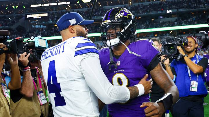 Dallas Cowboys quarterback Dak Prescott hugs Baltimore Ravens quarterback Lamar Jackson after the game at AT&T Stadium. Dallas Cowboys quarterback Dak Prescott hugs Baltimore Ravens quarterback Lamar Jackson after the game at AT&T Stadium.