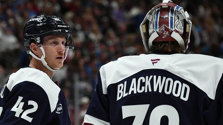 Oct 3, 2026; Denver, Colorado, USA; Colorado Avalanche defenseman Josh Manson (42) talks with goalie Mackenzie Blackwood (39) during the first period against the St. Louis Blues at Ball Arena. Mandatory Credit: Christopher Hanewinckel-Imagn Images