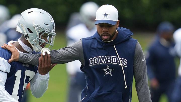 Dallas Cowboys cornerback Caleb Downs is coached through a drill with defensive coordinator Christian Parker Dallas Cowboys cornerback Caleb Downs is coached through a drill with defensive coordinator Christian Parker