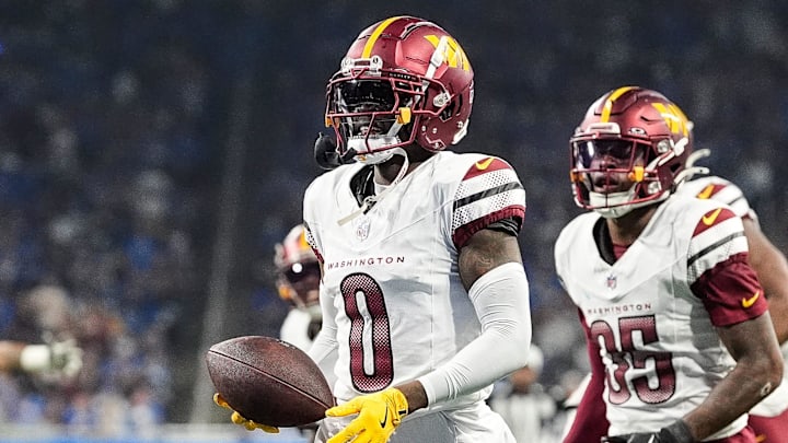 Washington Commanders cornerback Mike Sainristil celebrates an interception against Detroit Lions.