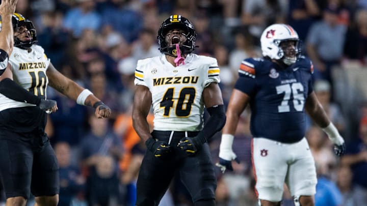 Missouri Tigers linebacker Josiah Trotter (40) celebrates a defensive stop as Auburn Tigers take on Missouri Tigers at Jordan-Hare Stadium in Auburn, Ala. on Saturday, Oct. 18, 2025. Missouri Tigers defeated the Auburn Tigers 23-17 in 2OT.