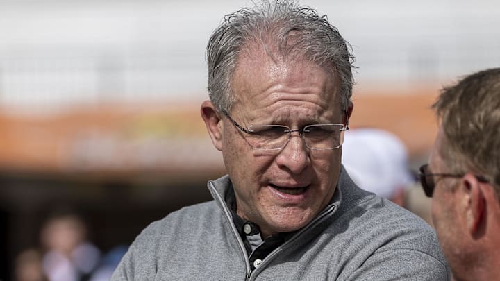Jan 29, 2025; Mobile, AL, USA; Florida State offensive coordinator Gus Malzahn talks with Auburn head coach Hugh Freeze during Senior Bowl practice for the American team at Hancock Whitney Stadium. Malzahn is a former Auburn football head coach. Mandatory Credit: Vasha Hunt-Imagn Images