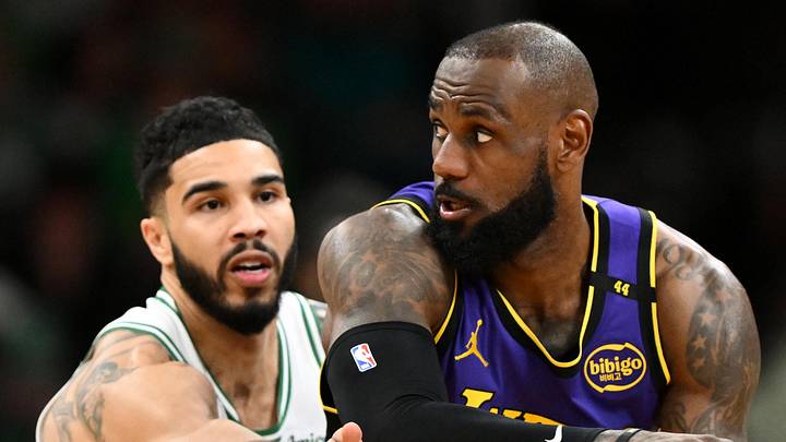 Mar 8, 2025; Boston, Massachusetts, USA; Los Angeles Lakers forward LeBron James (23) controls the ball against Boston Celtics forward Jayson Tatum (0) during the fourth quarter at the TD Garden. Mandatory Credit: Brian Fluharty-Imagn Images