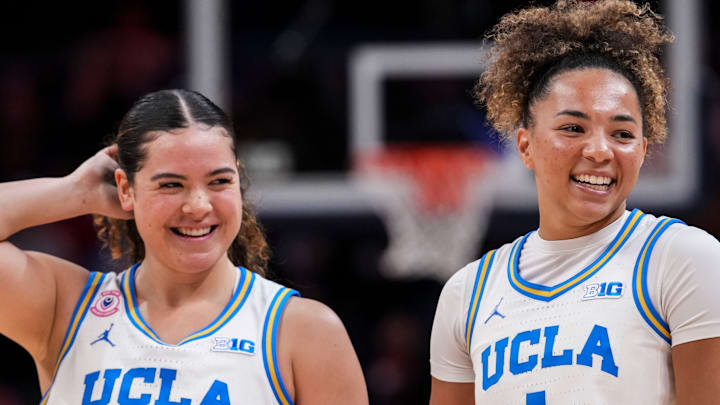UCLA Bruins guard Charlisse Leger-Walker (5) and UCLA Bruins guard Kiki Rice (1) smile during player introductions Saturday, March 7, 2026, during a Big Ten women's basketball tournament semifinals game at Gainbridge Fieldhouse in Indianapolis. UCLA Bruins guard Charlisse Leger-Walker (5) and UCLA Bruins guard Kiki Rice (1) smile during player introductions Saturday, March 7, 2026, during a Big Ten women's basketball tournament semifinals game at Gainbridge Fieldhouse in Indianapolis.
